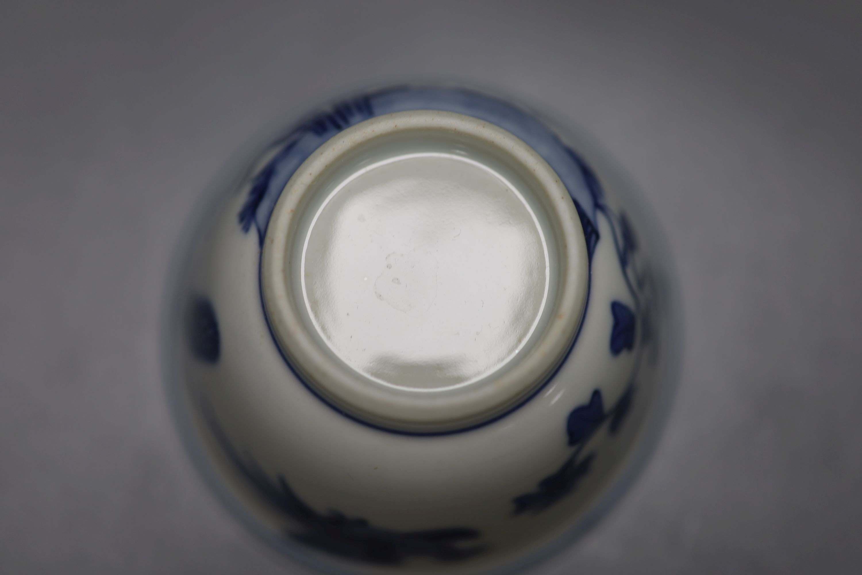 Five Chinese blue and white 'birds' tea bowls and four saucers and three 'chicken' tea bowls and four saucers (16)